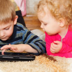 Two kids with digital tablet